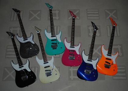 Seven Charvel Spectrum Guitars